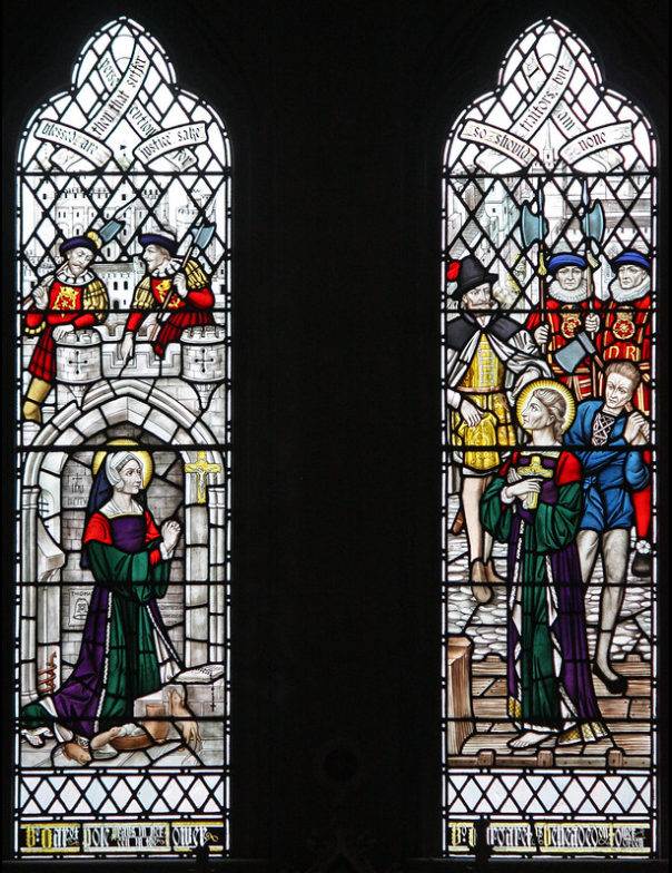 Stained glass windows of Gothic Revival Our Lady and the English Martyrs Church, Cambridge depicting Blessed Margaret Pole at prayer in her cell at the Tower of London and her beheading at Tower Green