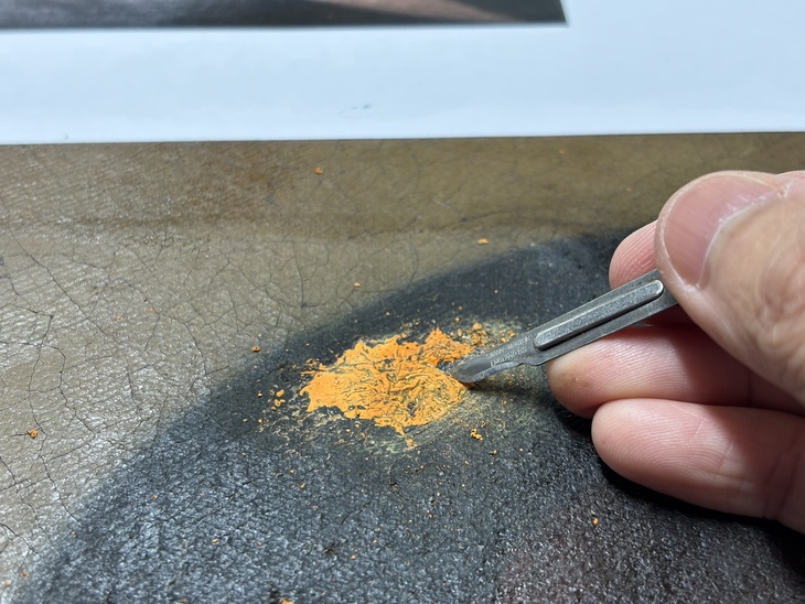 The painting being cleaned
