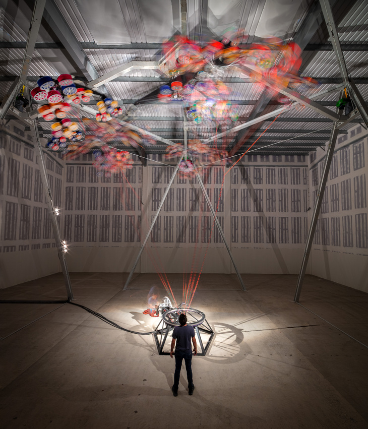 A person surveying the artwork