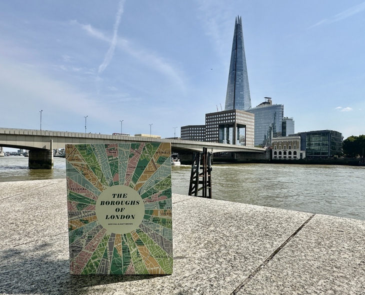The Boroughs of London Book in front of the Shard