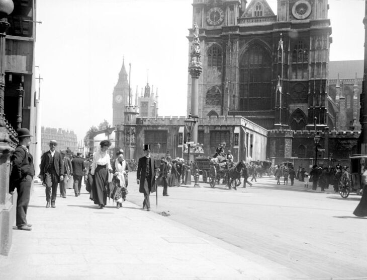 People walking past Parliament