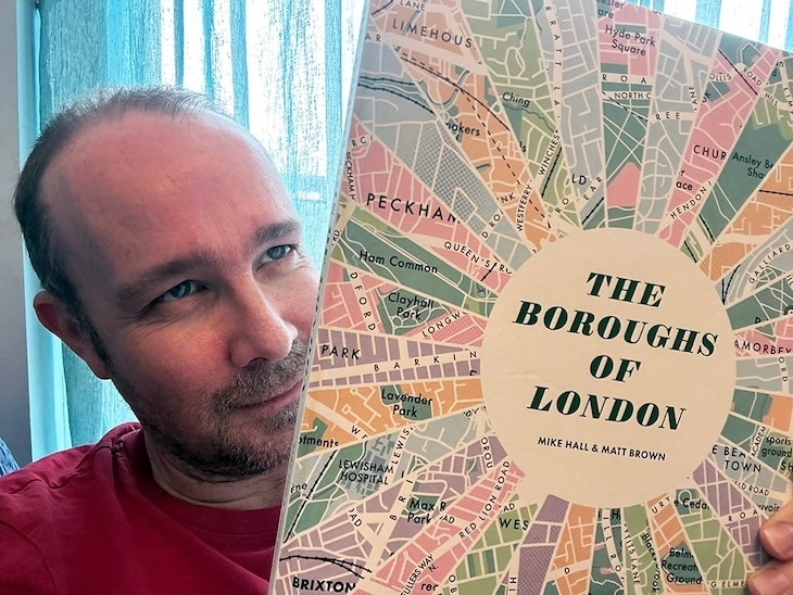 Matt Brown with his book The Boroughs of London