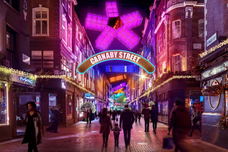 London Christmas lights 2025: a glowing pink star illuminated above Carnaby Street