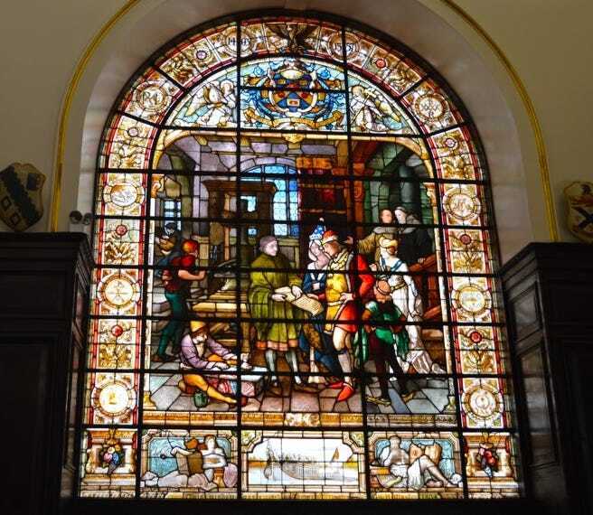 Stained glass window of caxton and his press