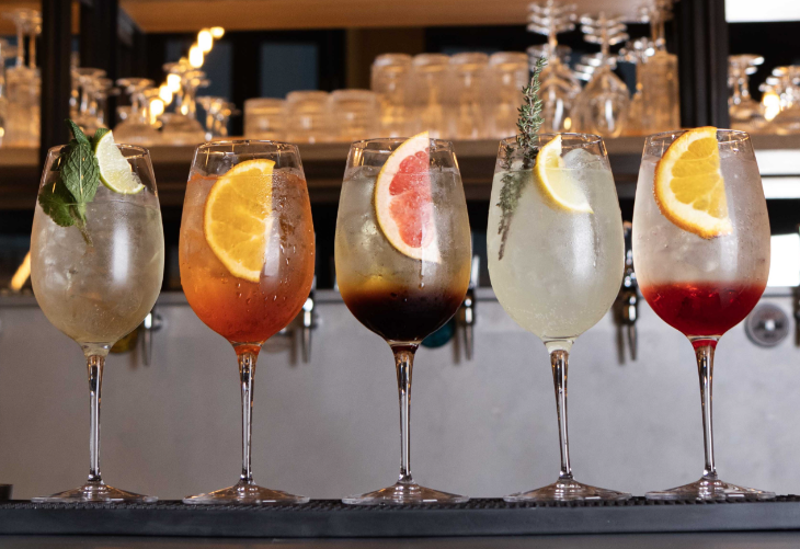 A row of cocktails