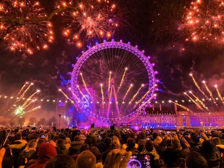 fireworks behind london eye