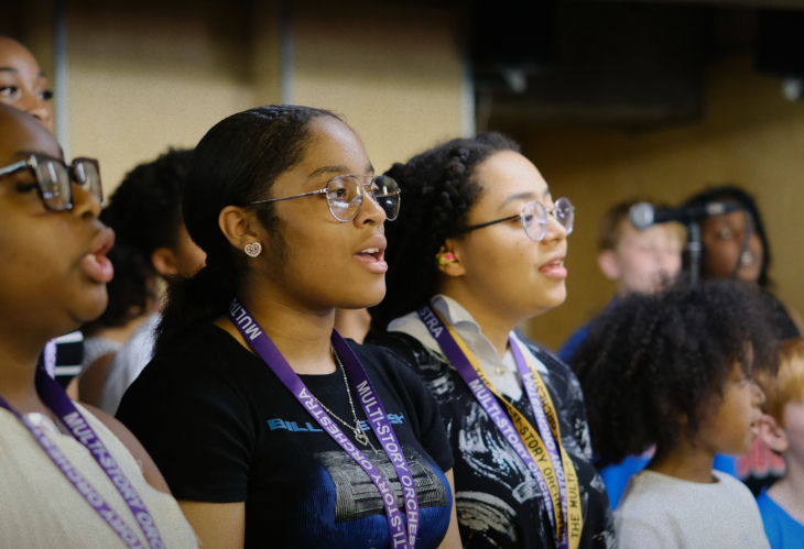 Today's events in London: members of the Multi Story Orchestra singing
