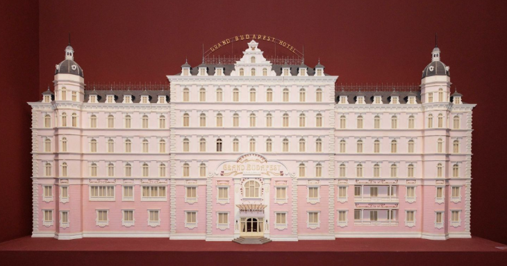 What's on in London in November 2025: a model of Wes Anderson's pastel pink Grand Budapest Hotel