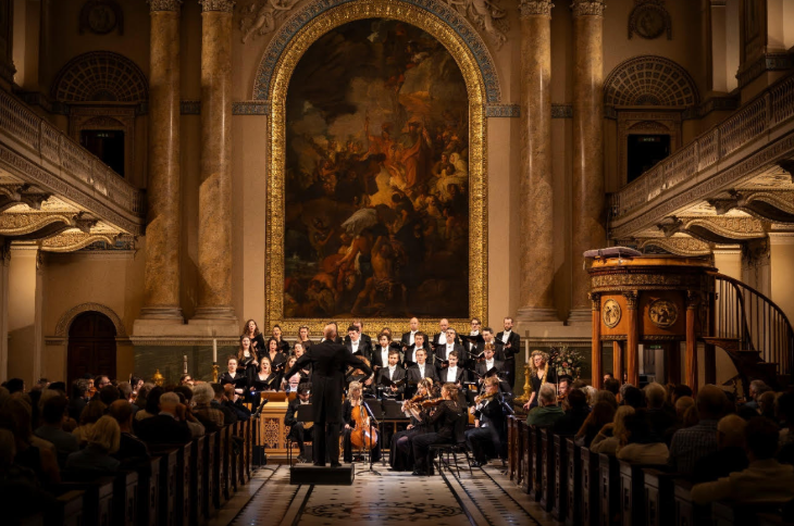 Thing to do in London today: an orchestra performing in an ornate hall