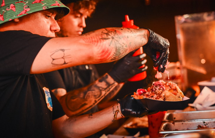 Things to do today in London: traders serving food at a taco festival