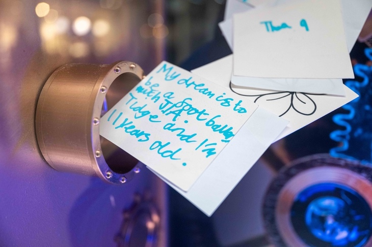 A child's letter being posted