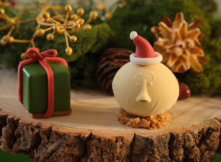 Best Christmas festive afternoon teas London 2025: pastries designed to look like a present and Moonface at the Magic Faraway Tree afternoon tea