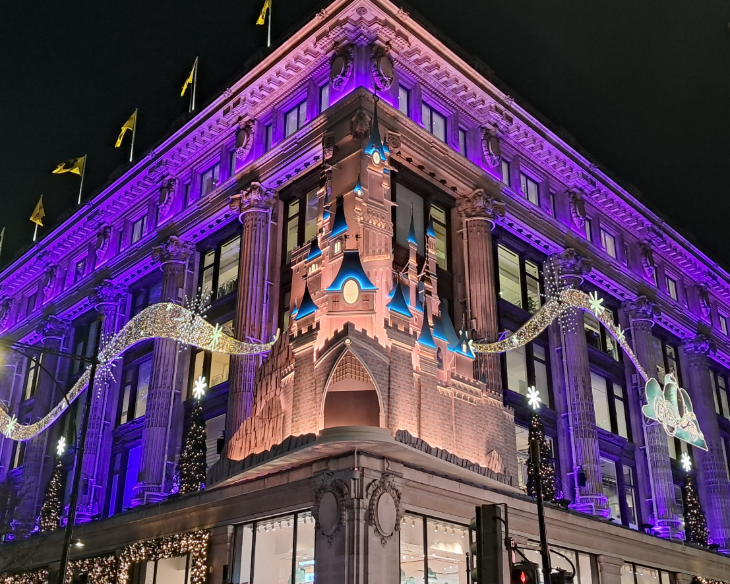 Self-guided Christmas lights walk London 2025: a Disney castle on the corner of the Selfridges building