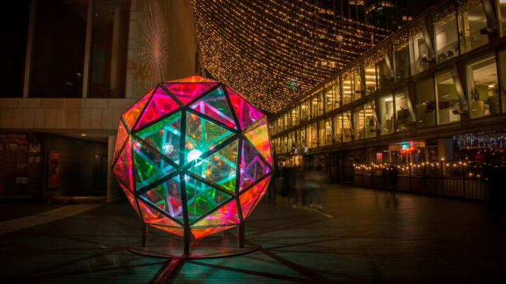 Free budget things to do in London at Christmas 2025: a glowing colourful orb outside Southbank Centre