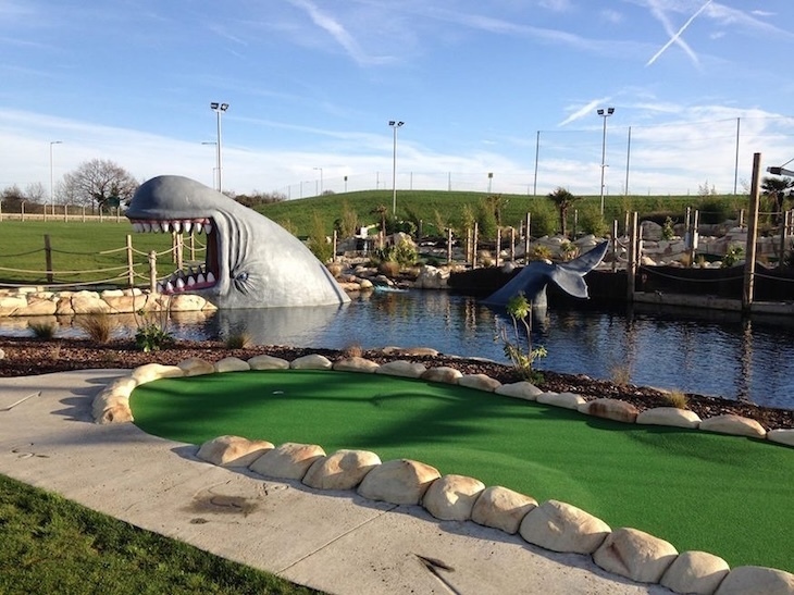 A whale-shaped obstacle on a crazy golf course