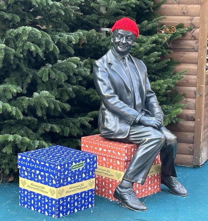 Mr Bean statue in a christmas hat