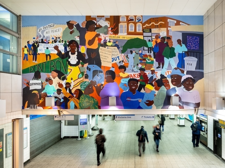 A colourful mural above a Tube station entrance