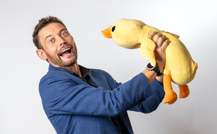 What's on in London today: a man holding a stuffed toy duck and pulling a funny face