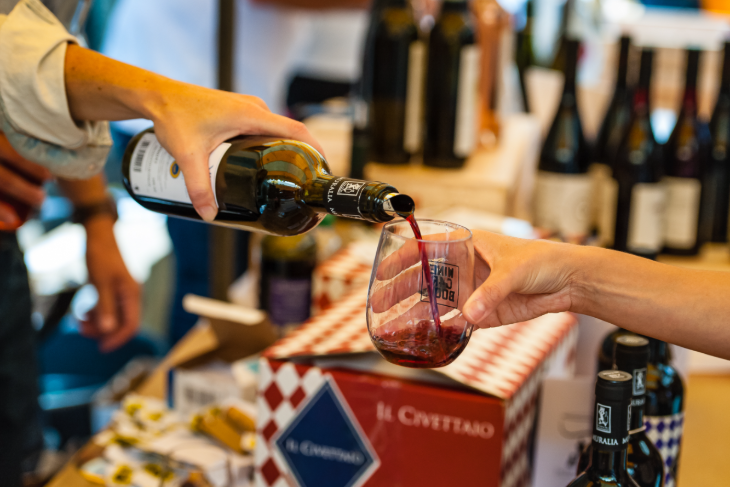 Things to do in London today: a glass of red wine being poured from a bottle
