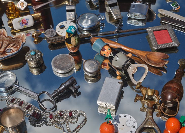 Things to do in London this weekend: various bric a brac items laid out on a mirrored table