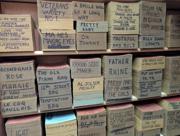 Stacks of cardboard music books