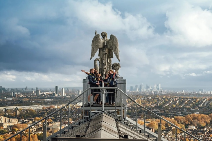People posing on the roof