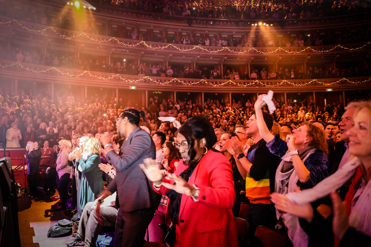People enjoying the choir at the Royal Albert Hall