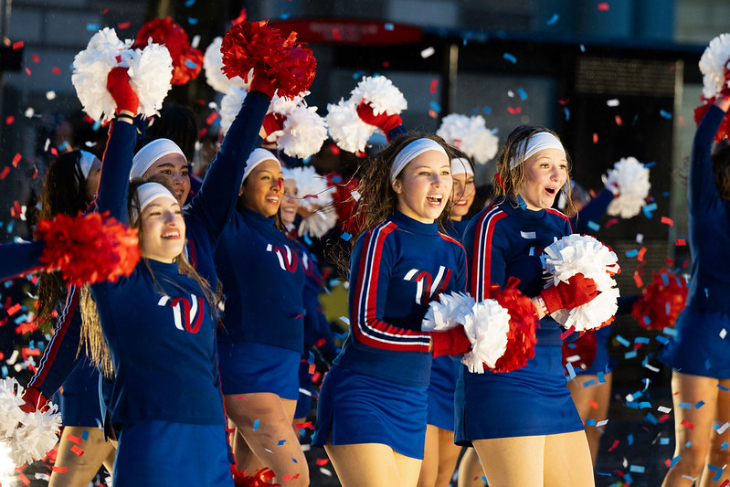 London New Year's Day Parade 2026: Cheerleaders in blue uniforms, carrying red and white pom poms