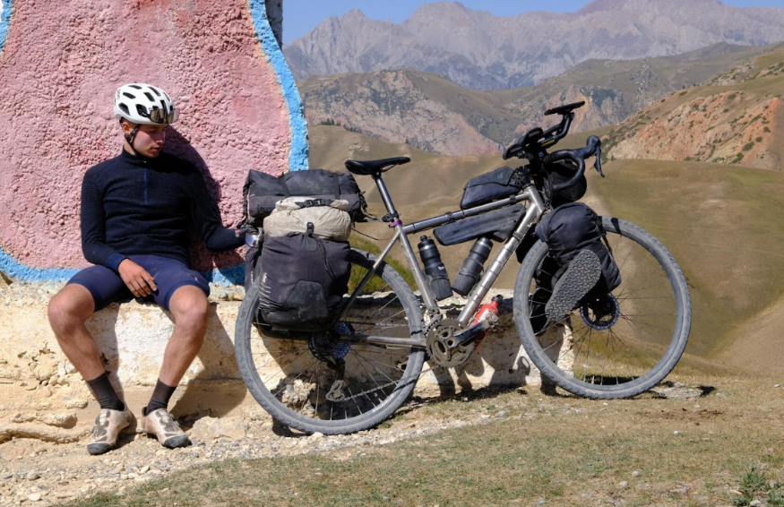 What's on in London this weekend: a person sitting next to a bike at the top of a mountain