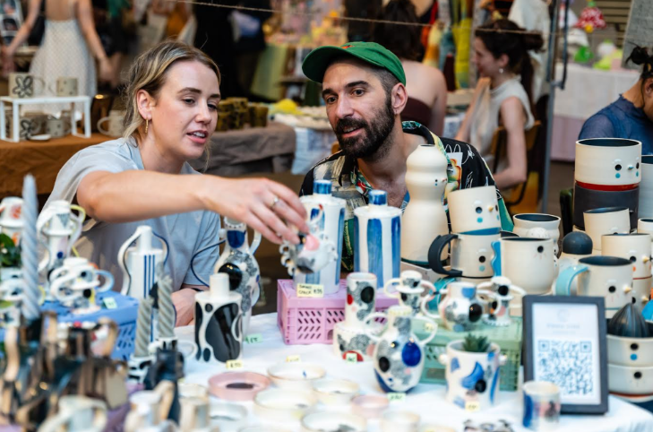 What's on in London this weekend: a couple browsing a ceramics stall