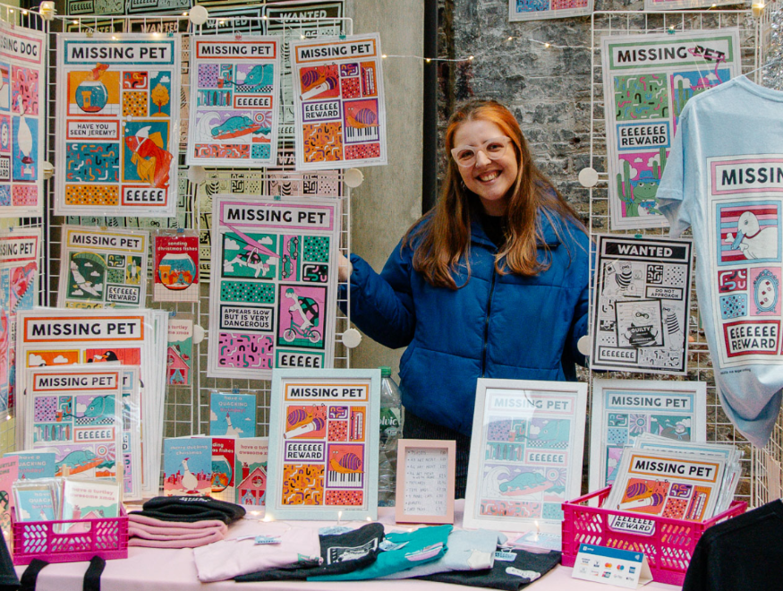 What's on in London this weekend: a woman posing at her stall at a craft fair