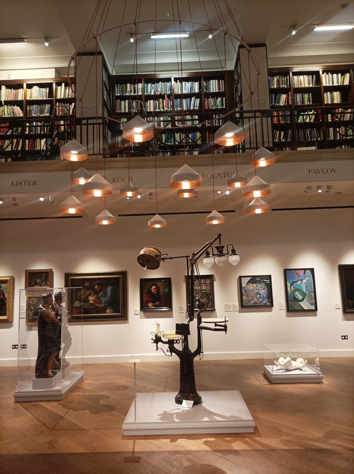 A library space with pictures on the wall