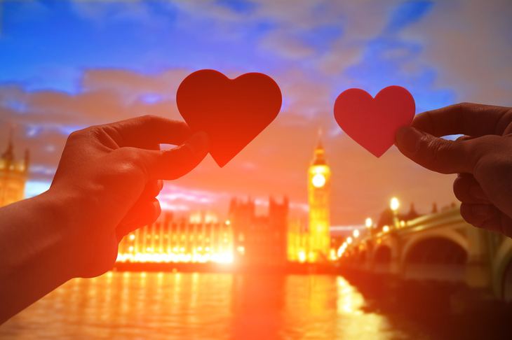 Valentine's Day 2026 in London: a pair of hands holding up paper hearts in front of Big Ben