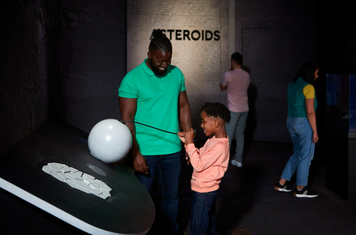 Top events in London in February 2026: a man and boy playing with an interactive exhibit