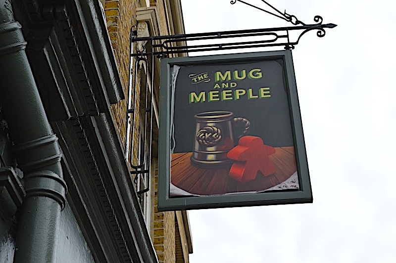 Mug and Meeple hanging sign