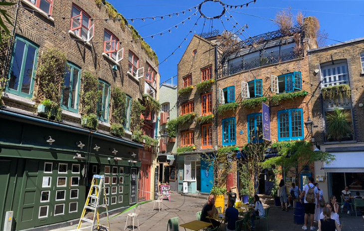 Neal's Yard, an enclosed courtyard with brick buildings with colourful window frames