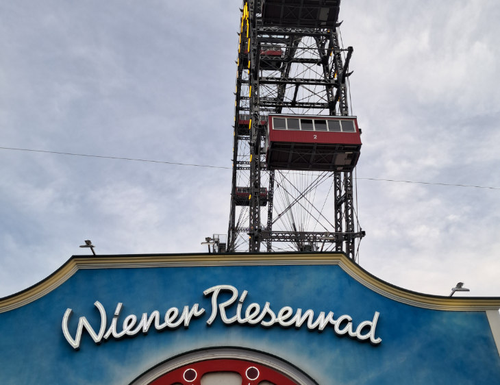 Best things to do in Vienna: a ferris wheel with red carriages