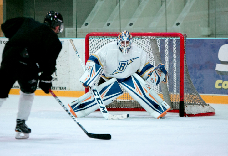 Winter sports in London: a goalie in goal at an ice hockey match