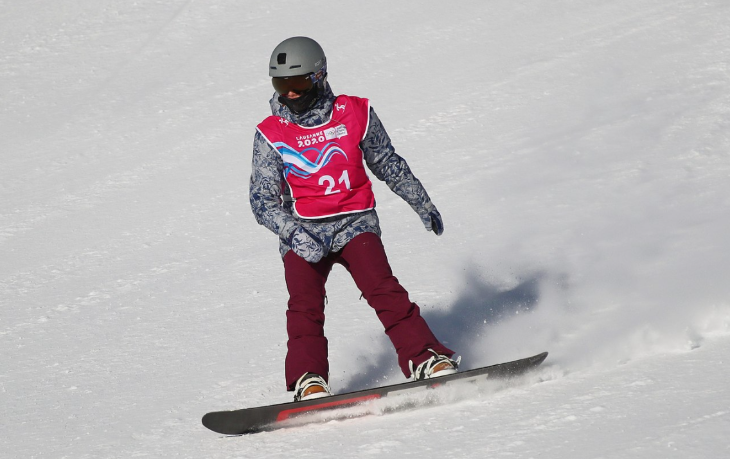 Winter sports in London:  a snowboarder on snow