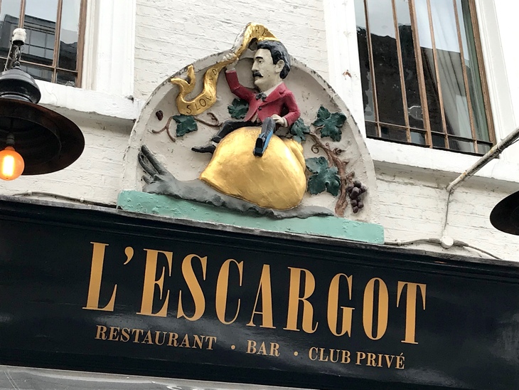 A sign for L'Escargot