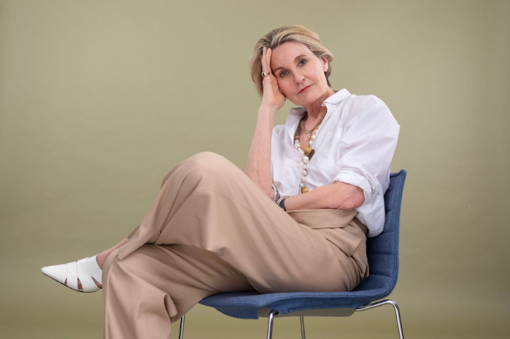 Mary Portas on a chair