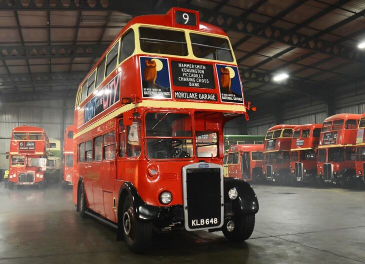 Vintage Routemasters in a garage