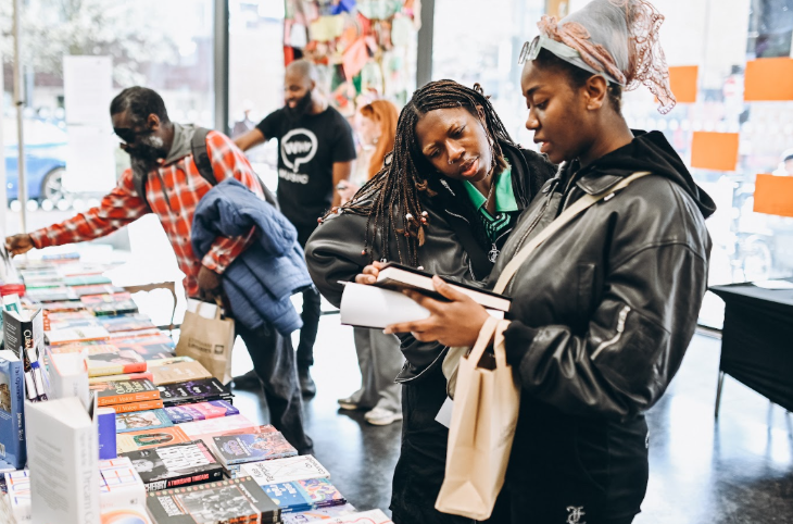 What's on in London March 2026: two people looking at a book at a book stall