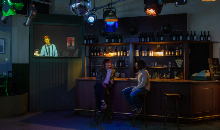 What's on in London March 2026: two people sitting at a receration of the bar from the Blitz Club