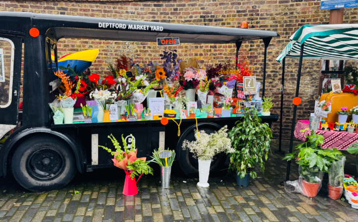 London's best flower displays: a vintage milk float being used as a stall to sell flowers