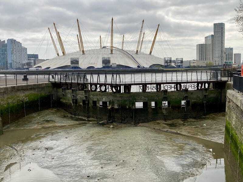 The East India Dock in east london with the o2 dome behind