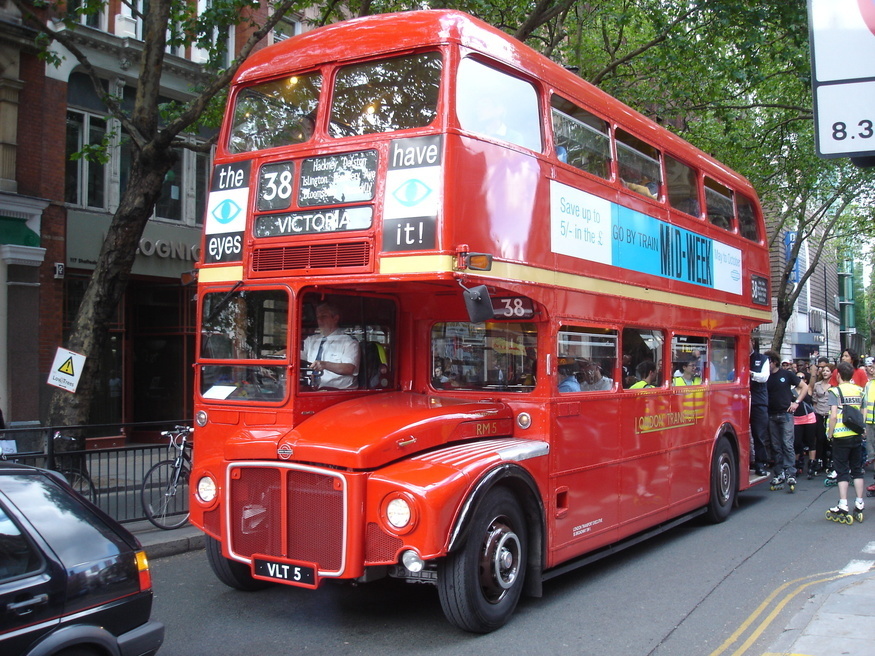 A vintage red double decker bus