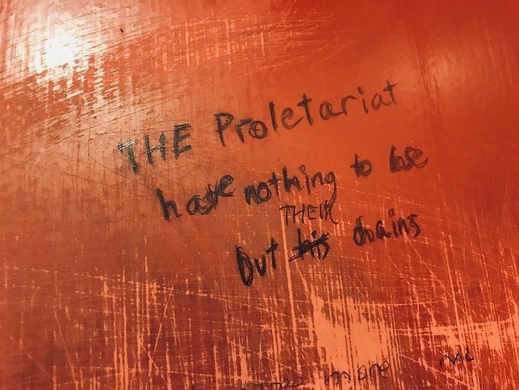 Graffiti saying the proletariat have nothing to lose but their chains