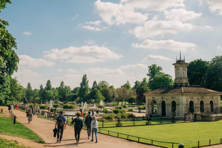 Best events in London today: people strolling through Kensington Gardens in the summer