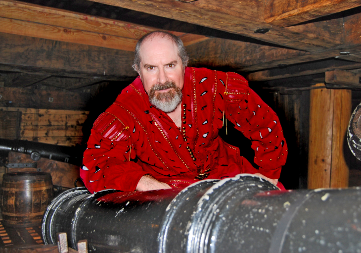 Top things to do in London today: a man leaning on a cannon and looking at the camera